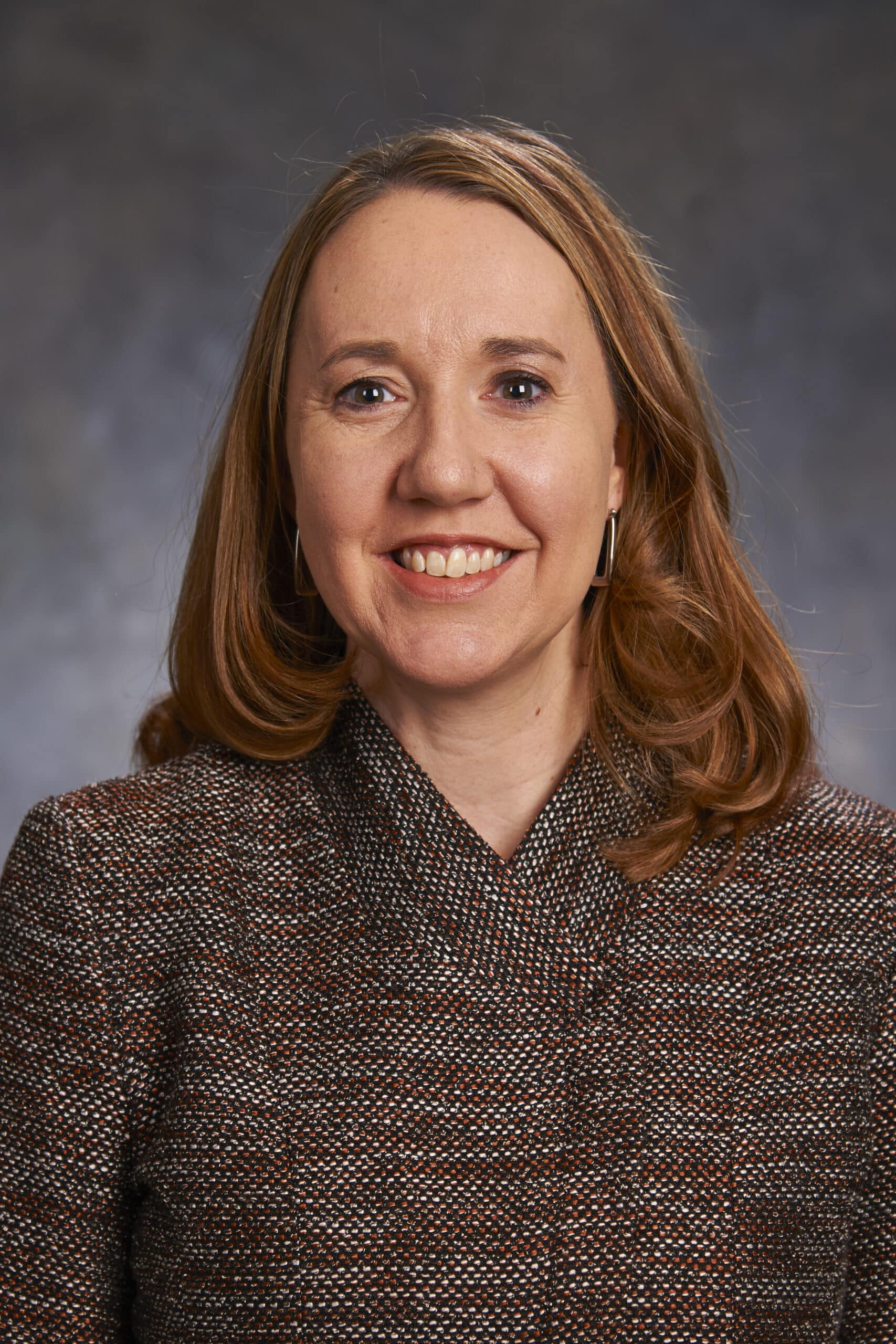 OnCon Icon Awards Recognize Julie M. Woolley of National Church