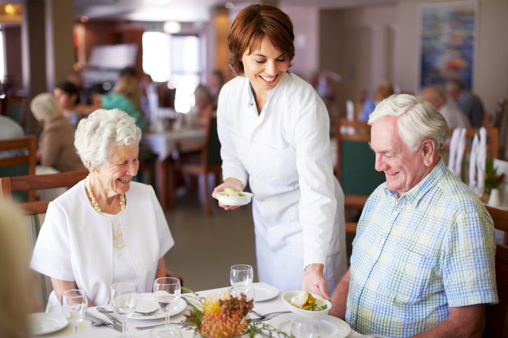 Chef serving seniors