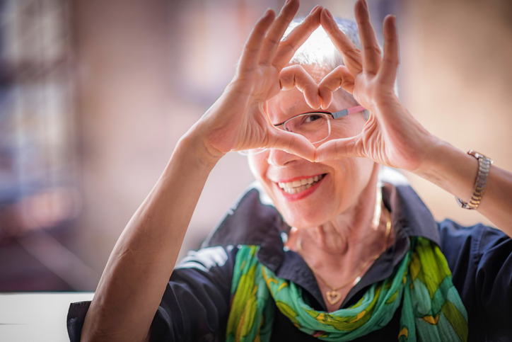 Senior with love sign