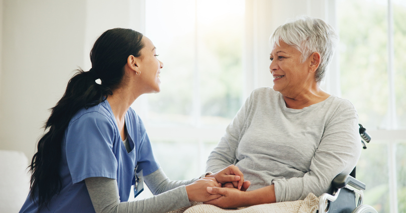 Senior comforted by care giver