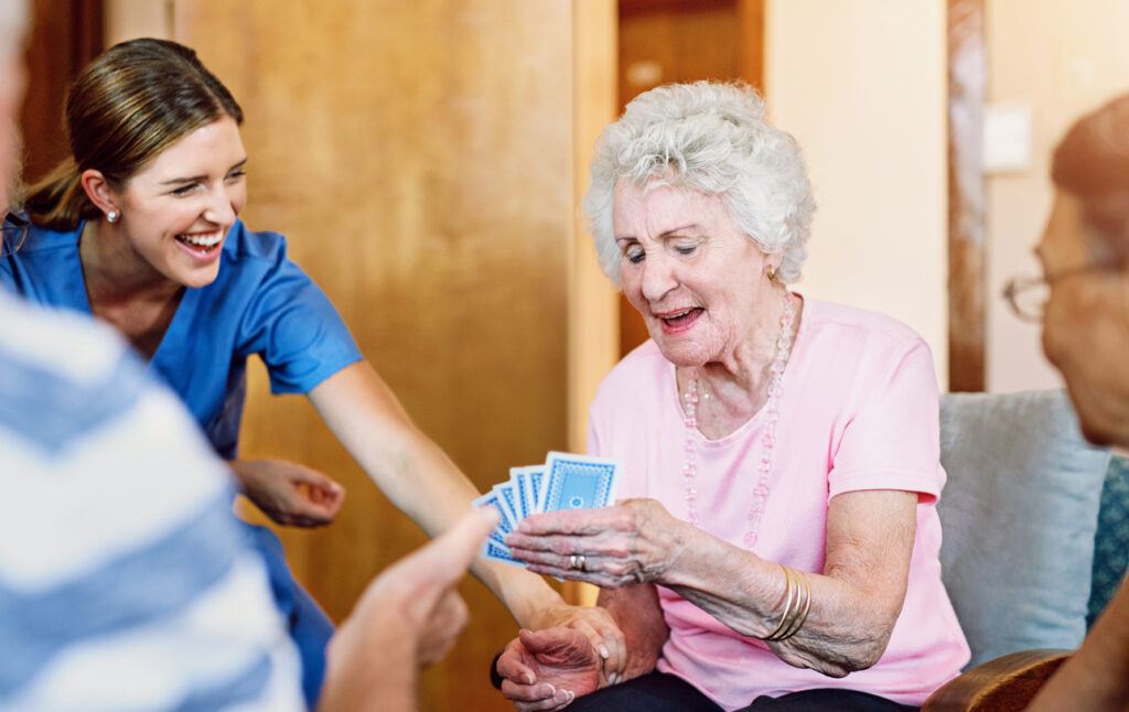 Senior enjoying cards