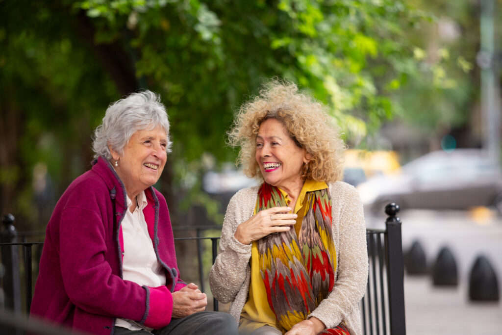 Seniors sitting on bench in the city_iStock-2157159505-1.jpg