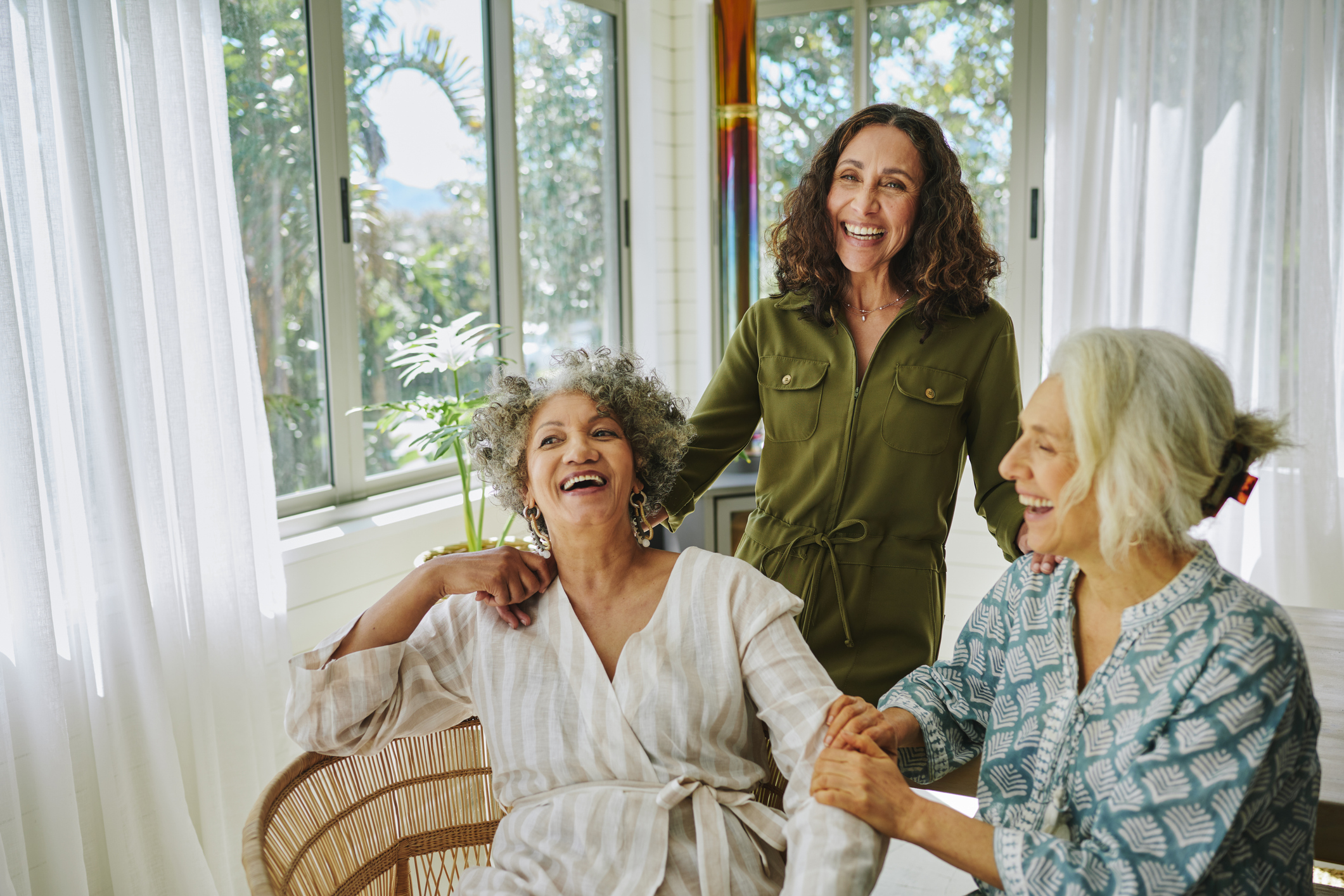 Seniors with family member visiting