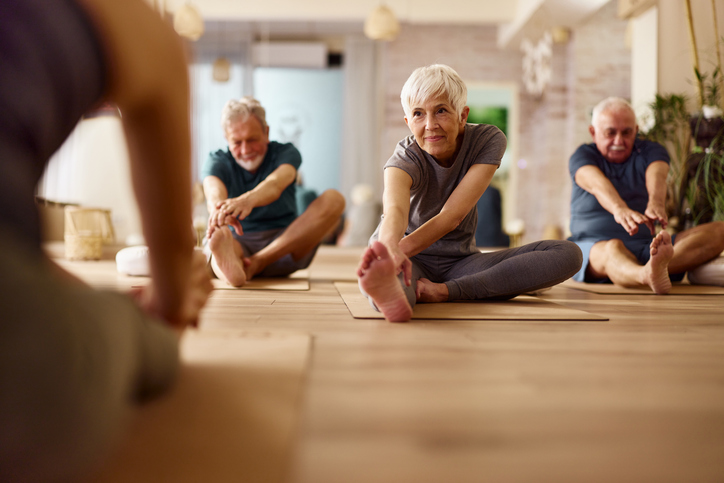 Seniors at yoga class