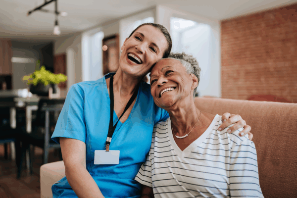 Happy nurse with a smiling senior