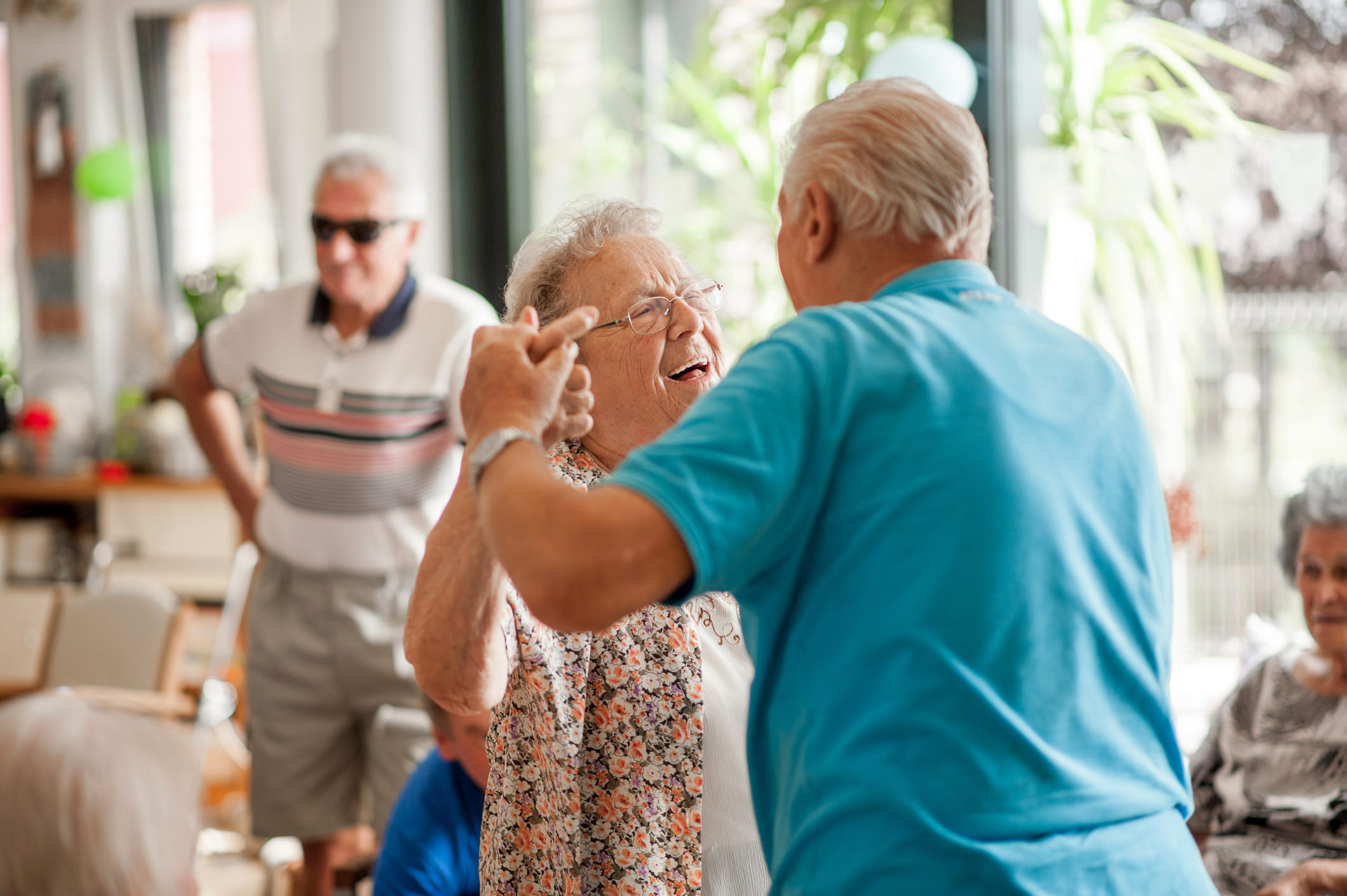 Senior couple happily dancing